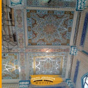 How do they plaster the wall of the mosque?